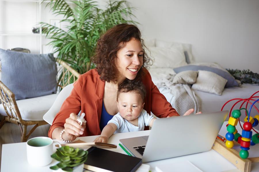 Lady and baby working from home